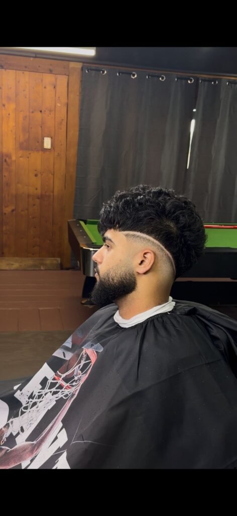 Mid drop fade haircut by The Fade Plug barber, Papakura, Auckland